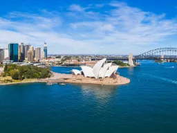 Zdjęcie lotnicze Sydney z mostem portowym, operą i panoramą miasta Zdjęcie lotnicze Sydney z mostem portowym, operą i panoramą miasta